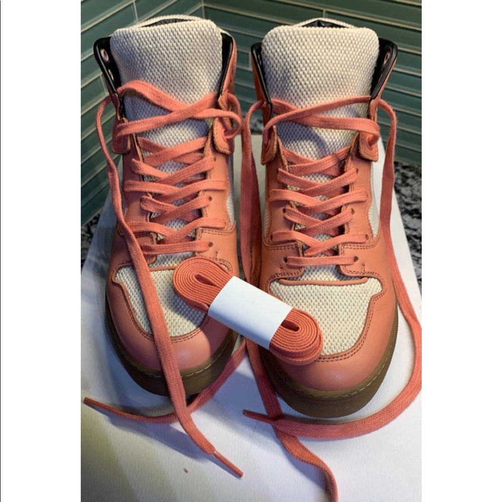 Women’s pink and white hi top sneakers, size EU36, US6
